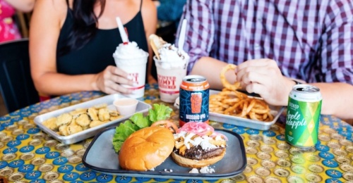 The chain from Local Favorite Restaurants specializes in customizable burgers that feature half-pound beef patties with toppings made in-house. (Courtesy Twisted Root Burger Co.)