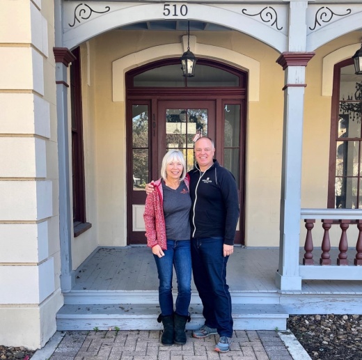Vera and Brent Deckard, co-owners of Kunstler Brewing Co., stand in front of Hemisfair's historic Pereida House, where they will open a second Kunstler restaurant in summer 2022. (Courtesy Kunstler Brewing Co.)