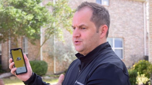 Frisco resident Greg Allbright on Dec. 2 was able to demo Wing's app-based drone delivery service at his home. (Matt Payne/Community Impact Newspaper)