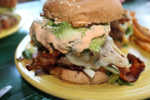 The Balrog Burger ($21.99): The newly added one-pound burger is topped with double cheese, bacon, avocado, mushrooms, jalapeño and chipotle mayo, with a fried, cream cheese stuffed jalapeño on top.(Sierra Rozen/Community Impact Newspaper)