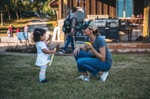 Foster Village founder Chrystal Smith interacts with a foster child at one of the nonprofits' two houses. (Courtesy Chrystal Smith)