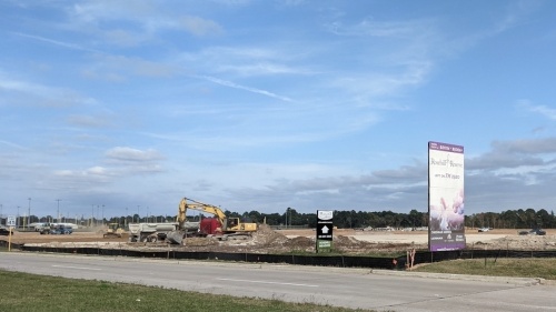 Site work is ongoing at the northeast corner of Cypress Rosehill Road and the Grand Parkway on the border of Tomball and Cypress to add infrastructure and stormwater detention areas for a future retail development. (Anna Lotz/Community Impact Newspaper)