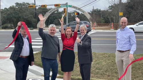 Austin officials hold a ribbon cutting for Anderson Mill Road