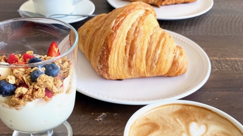 yogurt and granola, croissant and latte