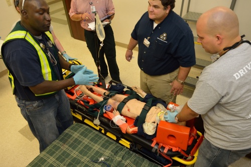 EMT students learn to treat patients during emergencies in a special accelerated training program. (Courtesy Acadian Ambulance Services)