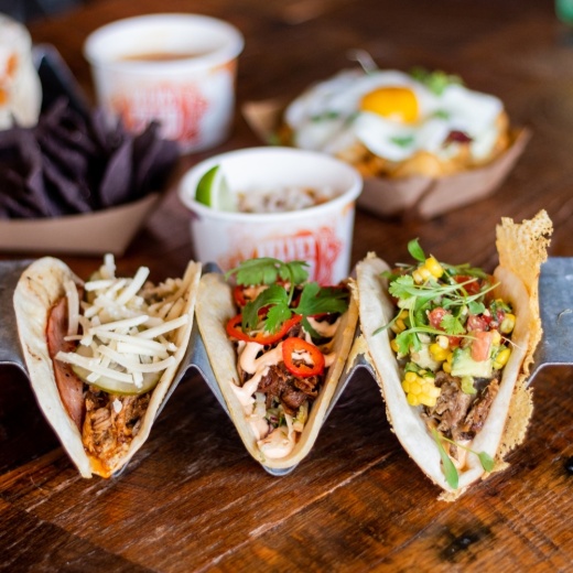 The Dallas-based restaurant serves more than 20 varieties of globally inspired tacos, such as the spicy tikka chicken, the falafel and the Korean pork. (Courtesy Velvet Taco)
