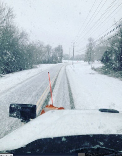 A Brentwood Public Works truck plows a street west of Wilson Pike on Jan. 16. Due to snowy weather, Williamson County Schools will be closed Jan. 18. (Courtesy city of Brentwood)