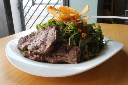 The Southwestern brisket salad ($14.25) is one of the salad options at Herb and Beet. (Andrew Christman/Community Impact Newspaper)