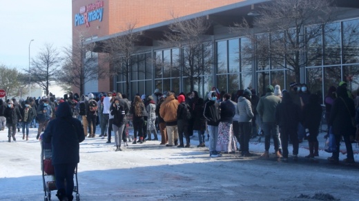 Lines wrapped around the back of the H-E-B store in the Mueller neighborhood amid Winter Storm Uri in February 2021. (Community Impact Newspaper file photo)