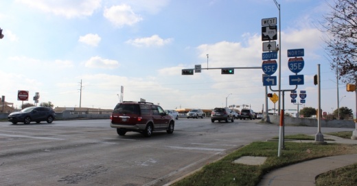 The Texas Department of Transportation will update three I-35E interchanges in Lewisville. Cars drive along Main Street in afternoon traffic. (Samantha Douty/Community Impact Newspaper)