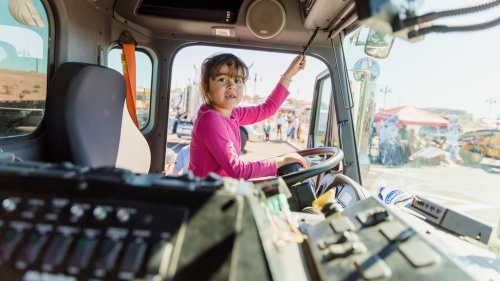 Child on truck at Truck-a-Palooza
