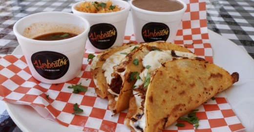 Queso birria tacos ($15): Three tacos are filled with marinated beef, Oaxaca cheese, onions and cilantro. (Courtesy Herbeato's Latin Inspired Food)