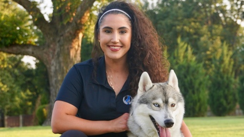 Yuni Alvarez, owner of Dog Training Elite's Frisco location, said her goal is "to help as many dogs and dog owners in DFW" as possible. (Courtesy Dog Training Elite)