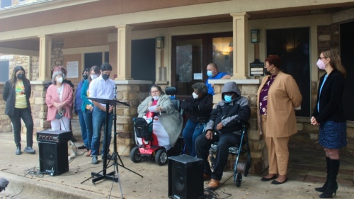 City officials and housing advocates joined residents of the Arbors at Creekside Apartments—including Jeanne Luttrall (center), a leader of the complex's residents association—for a discussion about proposed tenants' rights policies Feb. 1. (Ben Thompson/Community Impact Newspaper)