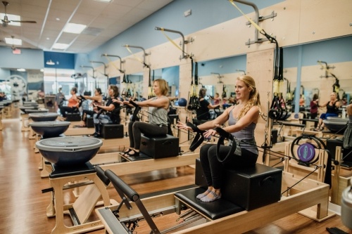 Club Pilates uses reformer machines that increase resistance during Pilates. (Courtesy Angela Doran)