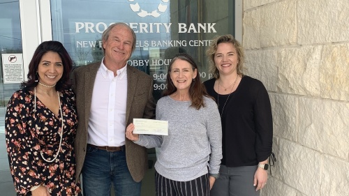 From left are Julie Rivas and Barry Williams of Prosperity Bank, Kellie Stallings of NB Housing Partners and Alice Jewell of the McKenna Foundation. Prosperity Bank donated funds to support the launch of First Footing. (Courtesy Kellie Stallings)