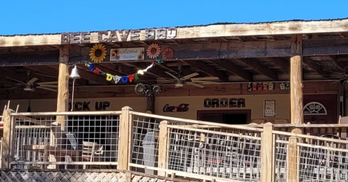 An image of the Bee Cave BBQ building from the outside.