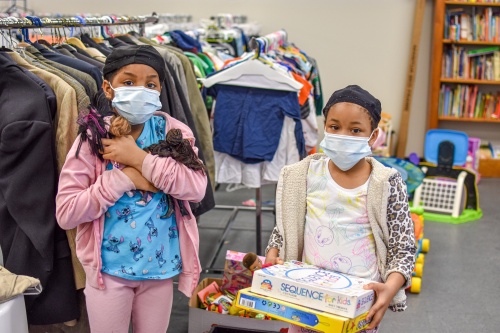 Children browse through clothing and toys at the HCC Clothes Closet, launched in 2009. (Courtesy Houston Children's Charity)