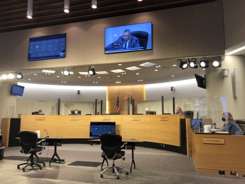 Travis County Commissioner Jeff Travillion speaks before the commission about a proclamation to officially recognize February as Black History Month in the county. (Maggie Quinlan/Community Impact Newspaper)