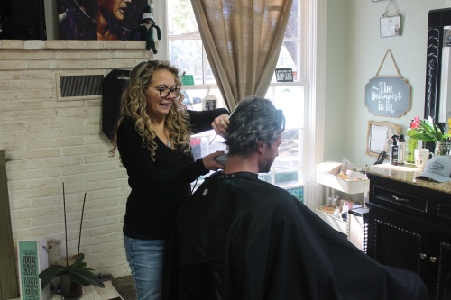 Corina Brown has owned the salon since 2016. (Sierra Rozen/Community Impact Newspaper)