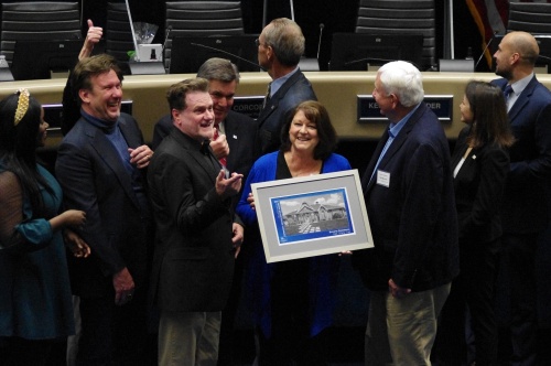 Richardson City Council members present an award for a revitalization project
