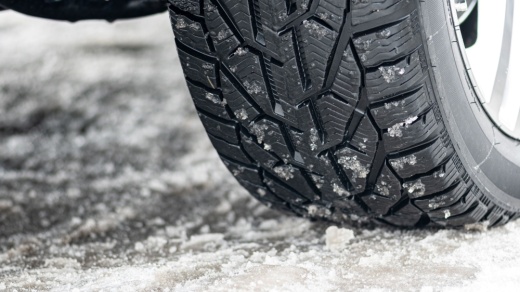 car tire on snowy road