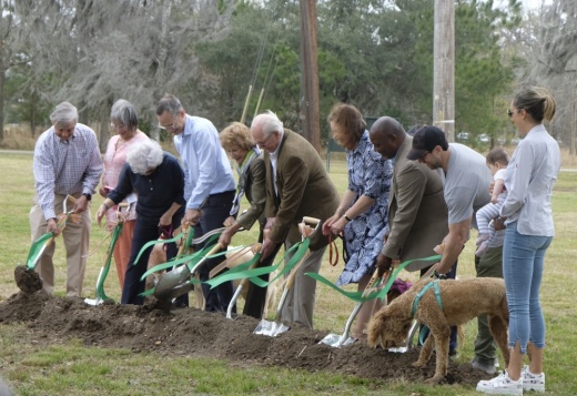 Key contributors to the Hermann Park Conservancy break ground on the McWilliams Dog Park. (George Wiebe/Community Impact Newspaper)