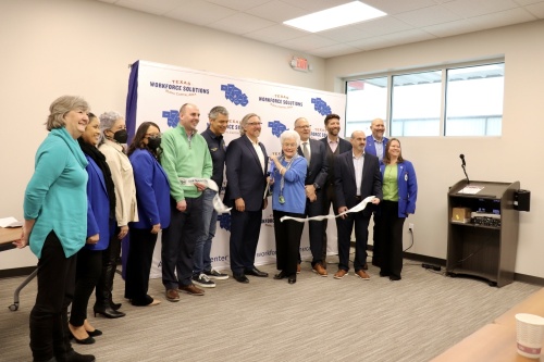 City leaders and leadership for the Workforce Solutions Rural Capital area held a grand opening and ribbon-cutting ceremony for the new Hays County Workforce Center on Feb. 23. (Zara Flores/Community Impact Newspaper)
