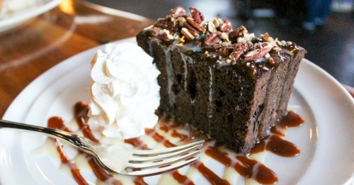 Chocolate Whiskey Cake ($7.50): The recipe for this chocolate cake, which is drizzled in whiskey-infused salted caramel, dates back to the prohibition era. (Emily Lincke/Community Impact Newspaper)