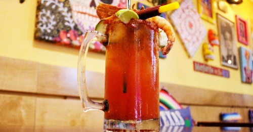 Michelada Preparada ($6.75): A special blend of spices mixed with shrimp, jerky, Clamato and the patron’s choice of beer combine to create this beverage. (Wesley Gardner/Community Impact Newspaper)