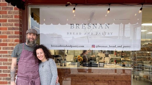 Matt and Jenna Bresnan in front of bakery window