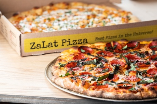 Zalat's simple basil pizza includes all-beef pepperoni, cracked black pepper and fresh basil. (Courtesy Kathy Tran/Zalat Pizza)
