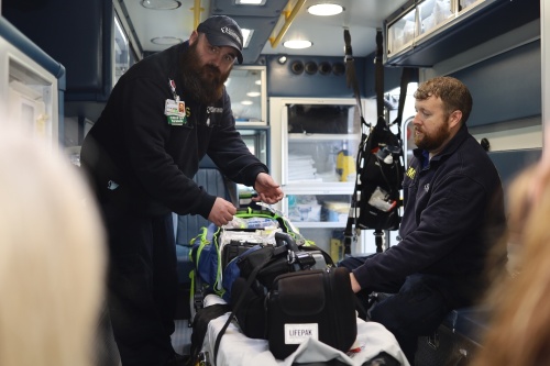 Critical care paramedic Jessie Hayes (left) and paramedic Chad Maddox demonstrate some equipment aboard a Williamson Medical Center ambulance. A new EMS station opened at the Brentwood Police Department at 910 Heritage Way, Brentwood, on March 9. (Courtesy Williamson Medical Center)