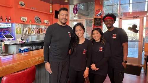 From left, Louisiana Crab Shack is run by Dennis Wilson, Cathy Duong-Wilson, Debbie Duong-Carter, Terry Carter and Lucky Duong (not pictured). (Grace Dickens/Community Impact Newspaper)