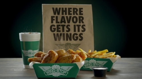 National Buffalo-style chicken wing franchise Wingstop is opening a new location at the Caney Crossing shopping center in New Caney March 24. (Courtesy Wingstop)