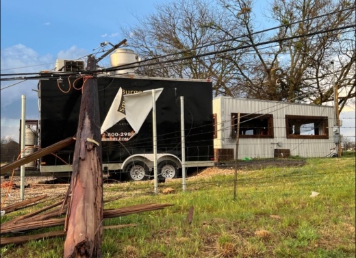 Downed power line and damaged food truck