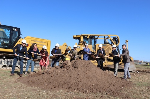 Leadership for the city of Kyle and Central Southwest Texas Development LLC broke ground on the Kyle Crossing Phase 2 development March 22. (Zara Flores/Community Impact Newspaper)