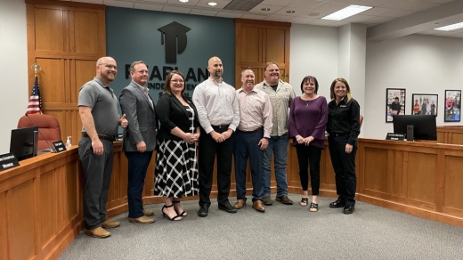Larry Berger (fourth from left) stands with the Pearland ISD board of trustees. (Andy Yanez/Community Impact Newspaper)