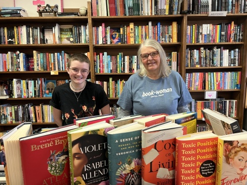 
From left: Senior bookseller Audrey Kohler and owner Susan Post, who are a part of the original collective who established the store in 1975, work together at BookWoman. (Zacharia Washington/Community Impact Newspaper)