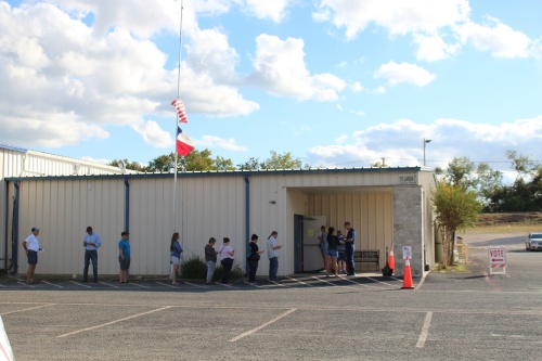 Voters wait outside the New Braunfels Knights of Columbus Hall to vote in this November file photo. (Eric Weilbacher/Community Impact Newspaper)