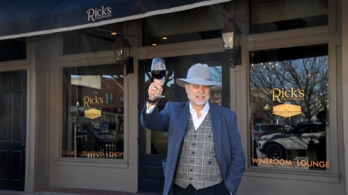 Rick Wells in front of Rick's Chophouse
