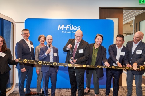 Mikko Hautala, ambassador of Finland to the United States (center), joins Antti Nivala, founder and CEO of M-Files (center left), and Laura Huffman, president and CEO of the Austin Chamber of Commerce (center right), for a ribbon cutting ceremony in celebration of M-Files' new Austin office and North American headquarters. (Courtesy M-Files)