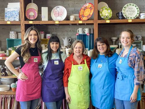 From left: Kyla Trlica, Cori Cano, owner Sandi Kirkwood, Marla Acker and Lacee Mims make up the Clay Casa team. Kirkwood purchased the business in 2014. (Eric Weilbacher/Community Impact Newspaper)
