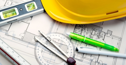 Construction hat and plans