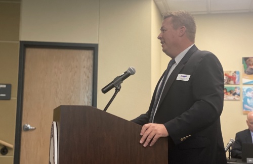 Brandon Cardwell, PfISD executive director of facilities and construction, addressed the school board during an April 21 meeting. (Brian Rash/Community Impact Newspaper)
