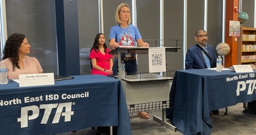 Jennifer Easley, NEISD Council of PTAs member, speaks at the NCPTA’s April 4 forum involving District 7 candidates Sandy Winkley (left) and Joseph Trevino. (Courtesy NEISD Council of PTA)
