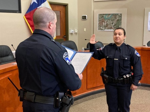 Saucedo is sworn in by Lakeway Police Chief Glen Koen.