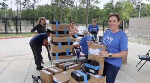 The Harris County Public Library, in partnership with the Houston-based nonprofit Literacy Now, announced April 26 the donation of 750 Chromebooks and Wi-Fi hotspots to families of students in Literacy Now's Reading Intervention program. (Courtesy of Literacy Now)