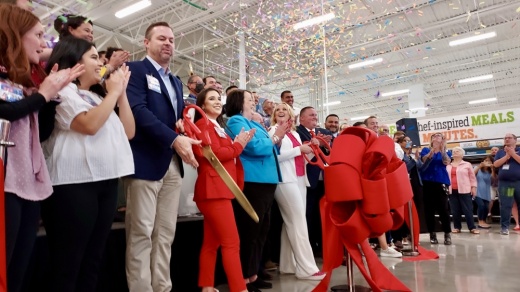 Representatives from H-E-B and local organizations attended a ribbon-cutting event April 28. (Lauren Canterberry/Community Impact Newspaper)