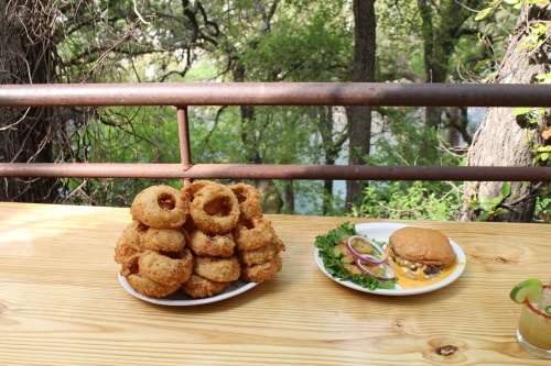 The Texas-size onion rings ($22.99) are served double-battered and deep-fried. They also come in smaller portions. (Photos by Eric Weilbacher/Community Impact Newspaper)